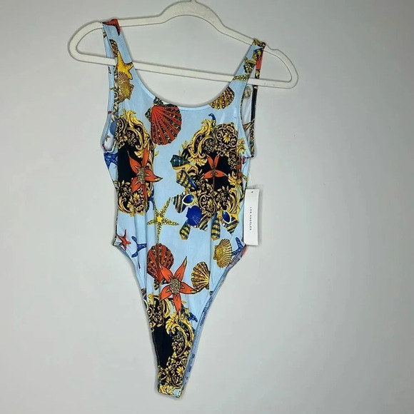 Timing Shell Pattern Blue Bodysuit - Picture 1 of 11